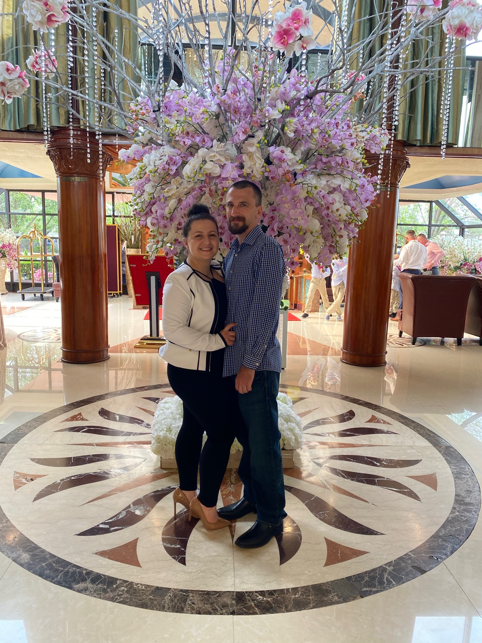 Hotel lobby beneath cascading flowers